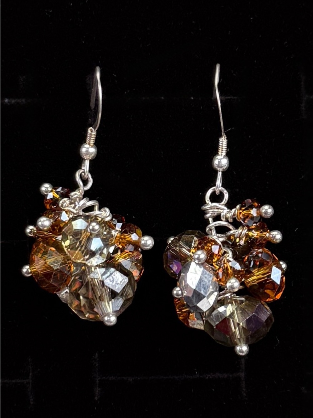 Elegant Silvertone clear and amber colored crystal cluster pierced earrings